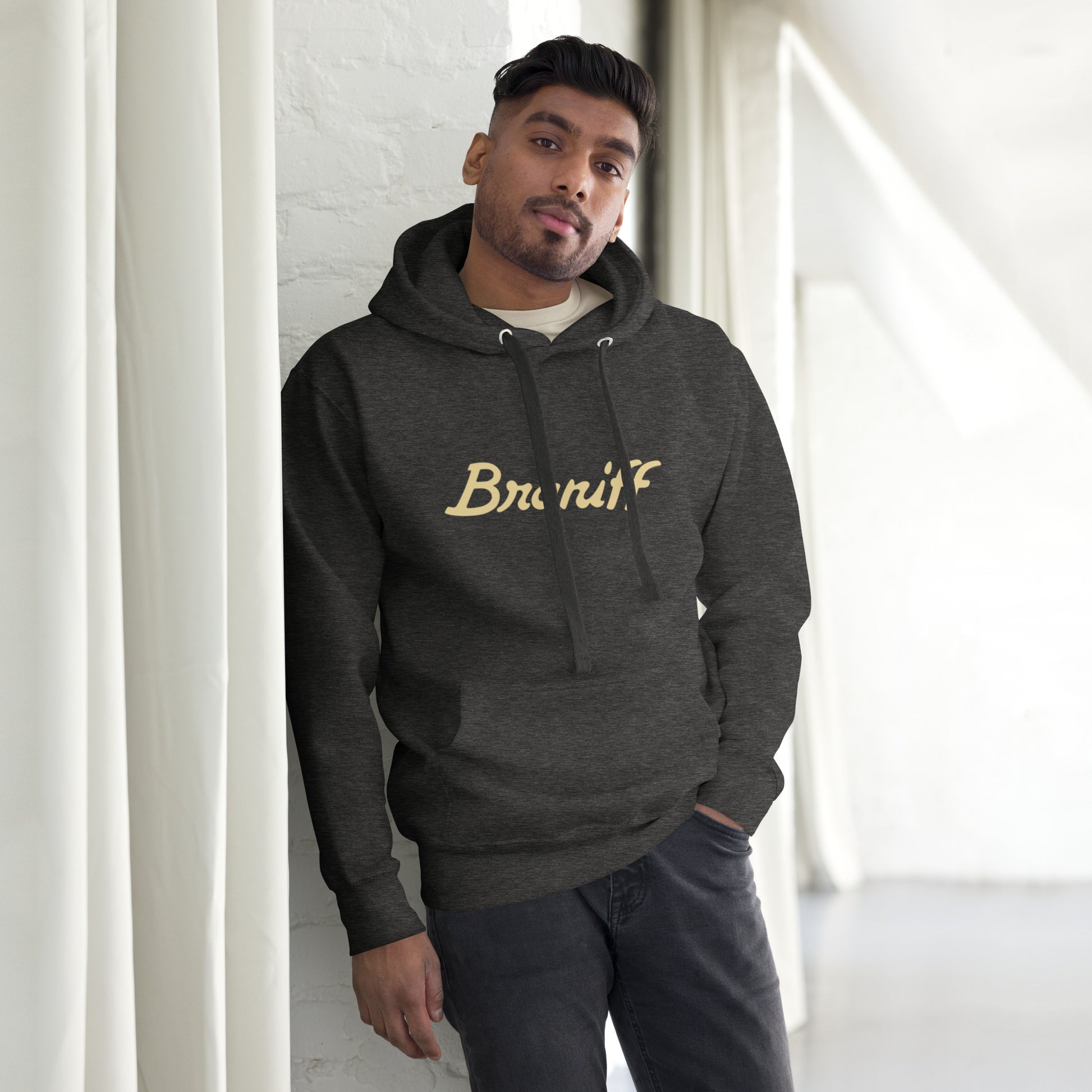 Unisex Premium Hoodie Charcoal Heather Front - Braniff Ultra Cream Beige 1978 Hoodie Sweatshirt Long Sleeve – Full Sleeve Hoodie - Braniff Boutique