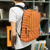 Backpack Braniff Alexander Girard End of the Plain Plane EOTPP Aircraft Interior Fabric 1965 Orange Orange Stripe